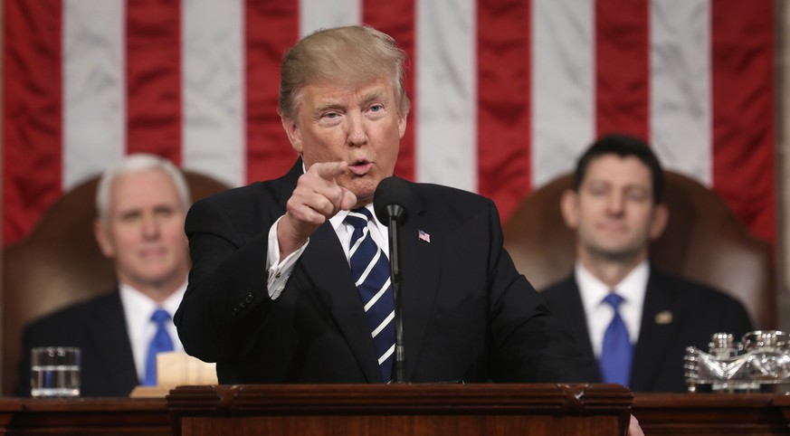 President Donald Trump addresses a joint session of Congress on Capitol Hill in Washington, Tuesday, Feb. 28, 2017. Vice President Mike Pence and House Speaker Paul Ryan of Wis. listen. (Jim Lo Scalzo ...
