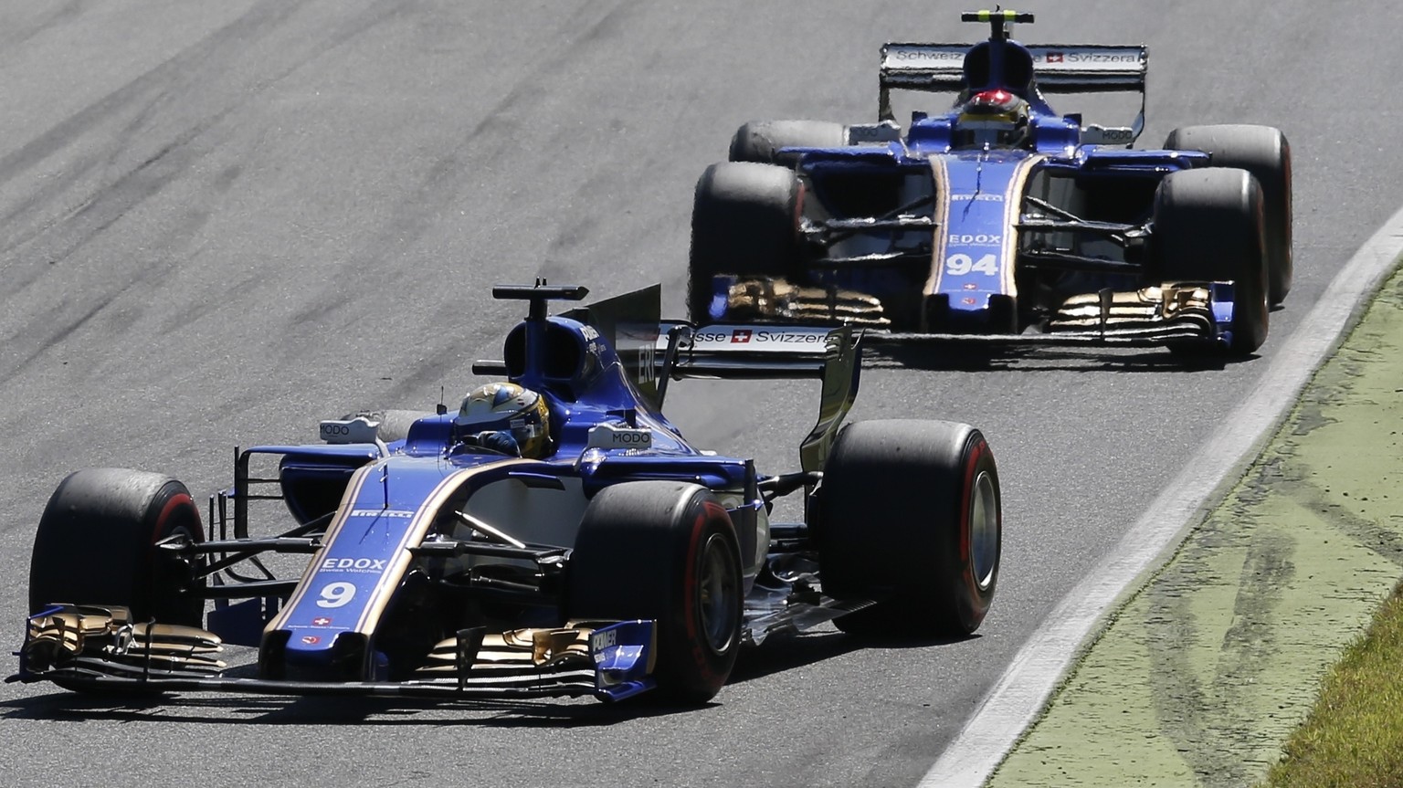 Sauber driver Marcus Ericsson of Sweden leads Sauber driver Pascal Wehrlein of Germany during the Italian Formula One Grand Prix, at the Monza racetrack, Italy, Sunday, Sept. 3, 2017. (AP Photo/Antoni ...