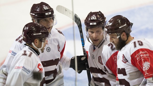 Sparta&#039;s Jaroslav Hlinka, Lukas Klimek, Petr Vrana, and Jan Piskacek, from left, celebrate the 0-1 goal, during the Champions Hockey League quarter final ice hockey match between Switzerland&#039 ...