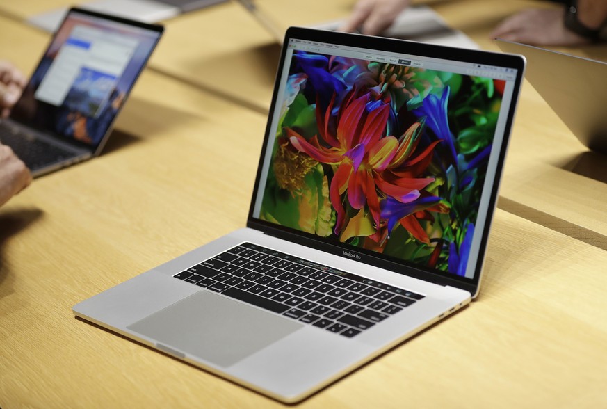 MacBook computers are shown in a demo room following the announcement of new products at Apple headquarters Thursday, Oct. 27, 2016, in Cupertino, Calif. (AP Photo/Marcio Jose Sanchez)