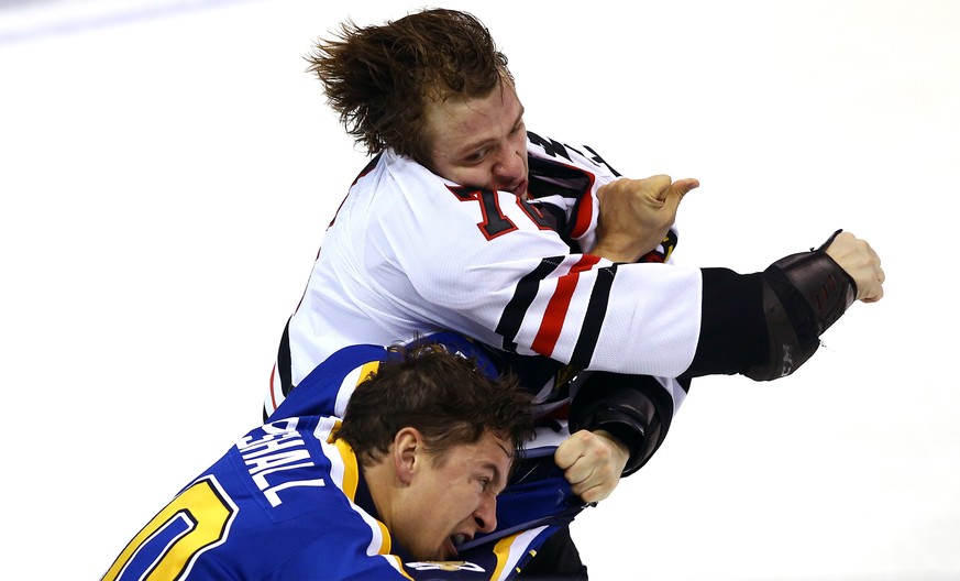 Nov 9, 2016; St. Louis, MO, USA; Chicago Blackhawks left wing Artemi Panarin (72) and St. Louis Blues right wing Scottie Upshall (10) brawl during the third period at Scottrade Center. The Blackhawks  ...