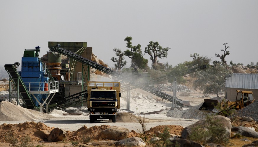 A truck is packed with crushed granite at a mining plant in Zamfara, Nigeria. April 21, 2016. REUTERS/Afolabi Sotunde