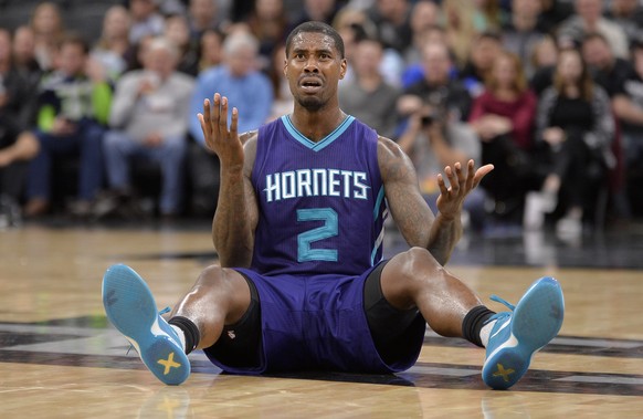 Charlotte Hornets forward Marvin Williams expresses disagreement with a foul call against the Hornets during the second half of an NBA basketball game against the San Antonio Spurs, Saturday, Jan. 7,  ...