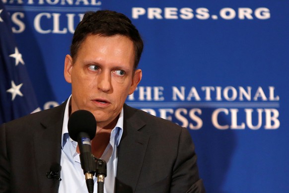 PayPal co-founder and Facebook board member Peter Thiel delivers his speech on the U.S. presidential election at the National Press Club in Washington, U.S., October 31, 2016. REUTERS/Gary Cameron