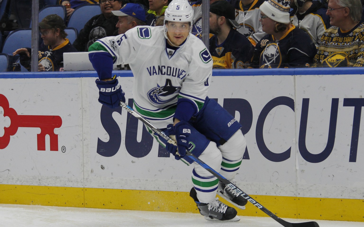 Vancouver Canucks defenseman Luca Sbisa (5) skates with the puck during the first period of an NHL hockey game against the Buffalo Sabres, Sunday, Feb. 12, 2017, in Buffalo, N.Y. (AP Photo/Jeffrey T.  ...