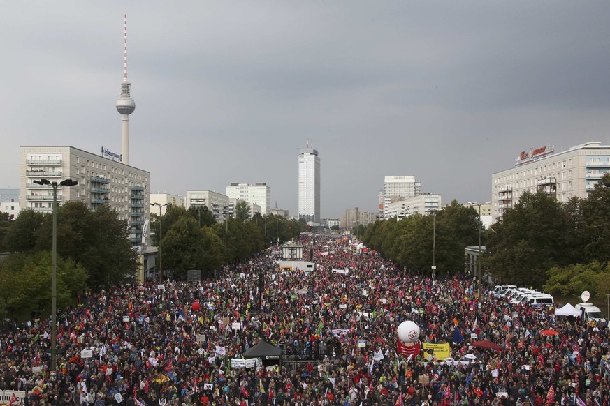 Consumer rights activists take part in a march to protest against the Transatlantic Trade and Investment Partnership (TTIP) and Comprehensive Economic and Trade Agreement (CETA) in Berlin, Germany, Se ...