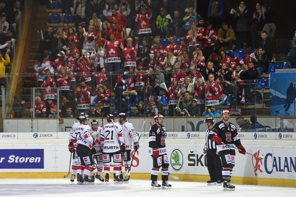 epa05690813 Canadas Andrew Ebbett celebrates with team-mates after scoring the 1-0 lead during the game between Mountfield HK and Team Canada at the 90th Spengler Cup ice hockey tournament in Davos, S ...
