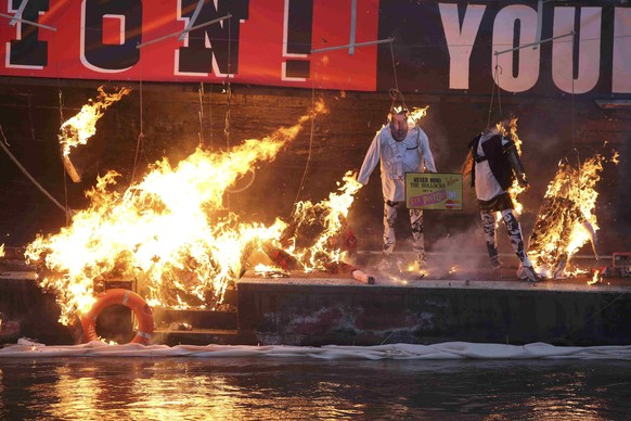 A collection of punk memorabilia belonging to Joe Corre, the son of Malcolm McLaren, the former manager of the Sex Pistols and fashion designer Vivienne Westwood, is burnt on a boat on the River Thame ...