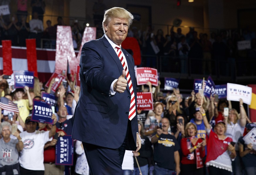 Republican presidential candidate Donald Trump arrives to speak during a campaign rally, Tuesday, Oct. 4, 2016, in Prescott Valley, Ariz. (AP Photo/ Evan Vucci)