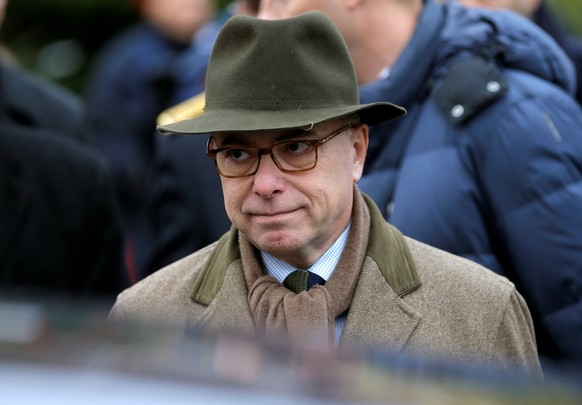 French Interior Minister Bernard Cazeneuve leaves after a visit at the traditional Christkindelsmaerik (Christ Child market) in Strasbourg, France, November 26, 2016. REUTERS/Vincent Kessler