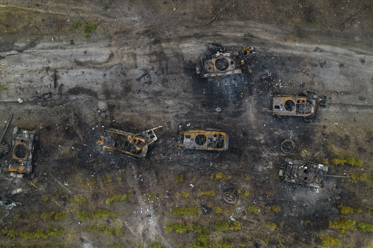 Destroyed Russian armored vehicles stand idle on the outskirts of Kyiv, Ukraine, Thursday, March 31, 2022. (AP Photo/Rodrigo Abd)