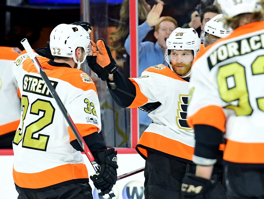 Feb 2, 2017; Philadelphia, PA, USA; Philadelphia Flyers center Claude Giroux (28) celebrates his goal with defenseman Mark Streit (32) against the Montreal Canadiens during the second period at Wells  ...