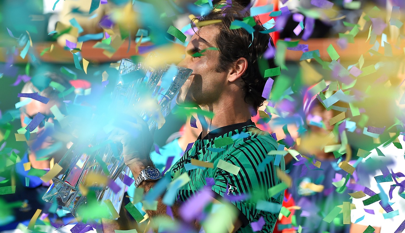 Mar 19, 2017; Indian Wells, CA, USA; Roger Federer (SUI) celebrates as confetti falls after he defeated Stan Wawrinka (not pictured) 7-6, 6-4 in the men&#039;s final in the BNP Paribas Open at the Ind ...
