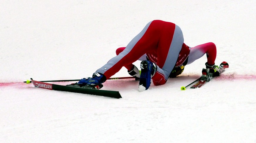 Austria&#039;s Hermann Maier kisses the red line after winning a mens ski World Cup giant slalom race at Val d&#039;Isere, France, Sunday, Dec. 10, 2000. The reigning world champion in 1997 was stripp ...