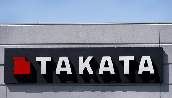 FILE PHOTO - A sign with the TAKATA logo is seen outside the Takata Corporation building in Auburn Hills, Michigan May 20, 2015. REUTERS/Rebecca Cook/File Photo