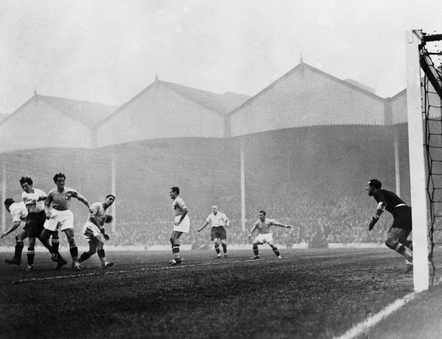 Action during the International match between England and World Cup Champions Italy at Arsenal Football ground, Highbury, London, on Nov. 14, 1934. Italian goalkeeper Carlo Ceresoli is seen right. (AP ...