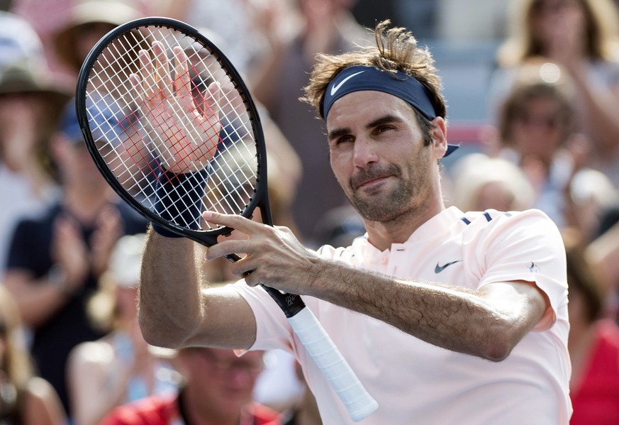 Roger Federer, of Switzerland, celebrates his victory over Roberto Bautista Agut, of Spain, during quarterfinal play at the Rogers Cup tennis tournament, Friday Aug. 11, 2017, in Montreal. (Paul Chias ...