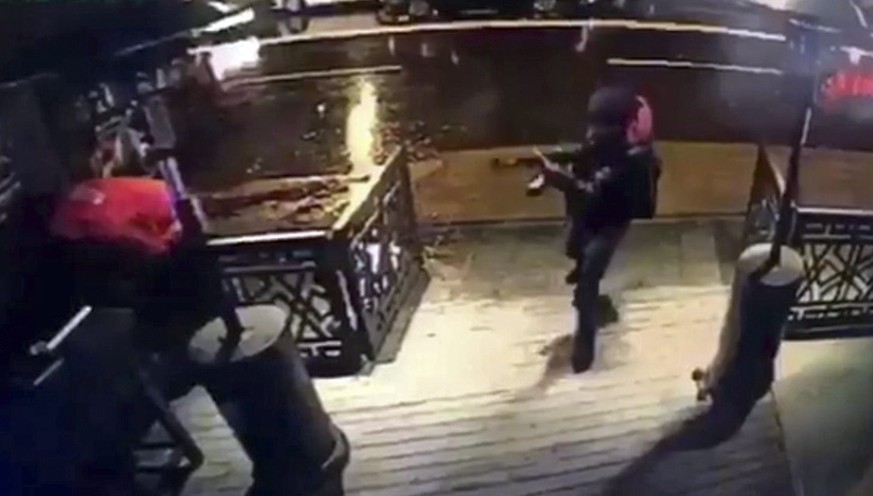 epa05694602 A video capture shows the gunman entering the Reina nightclub, a popular night club in Istanbul near by the Bosphorus, in Istanbul, Turkey, early 01 January 2017. At least 39 people were k ...