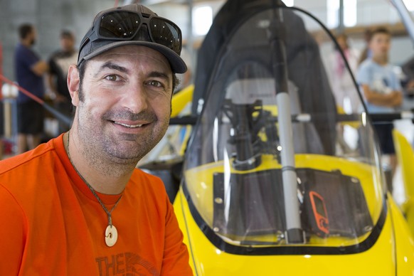 The adventurer Xavier Rosset in front of his LSA aircraft who is taking off today for a circumnavigation of the world within 400 days in a Light Sport Aircraft starting in Sion, Switzerland, Sunday, J ...