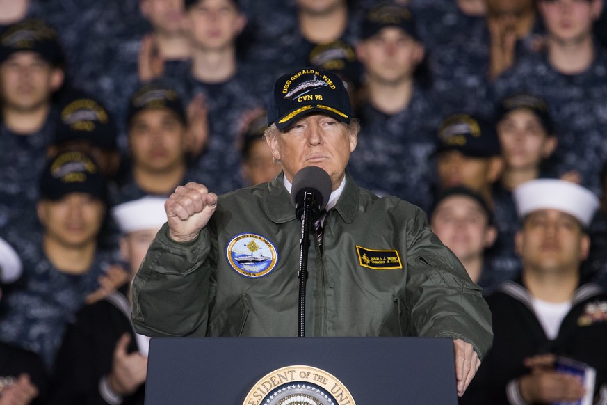 epa05825758 US President Donald J. Trump speaks to sailors aboard the Gerald R. Ford aircraft carrier in Newport News, Virginia, USA, 02 March 2017. Trump spoke about military readiness and his propos ...