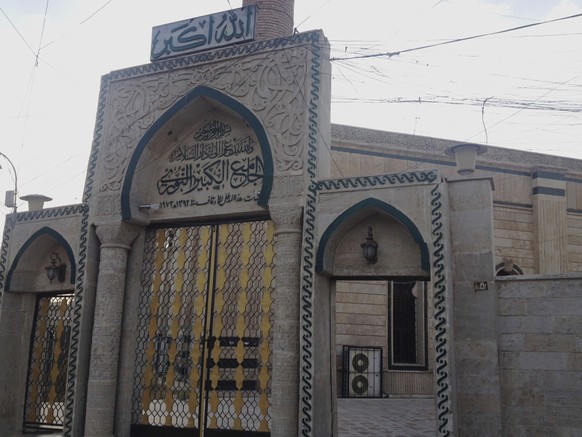 FILE - In this Sunday, July 6, 2014 file photo, the gate of the Great Mosque or al-Nuri Mosque is seen in the northern city of Mosul, Iraq. The Islamic State group destroyed Mosul’s al-Nuri mosque and ...