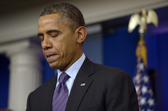 epa05706751 (FILE) - A file picture dated 05 December 2013 shows US President Barack Obama as he delivers remarks on the passing of former South African President Nelson Mandela from the press briefin ...