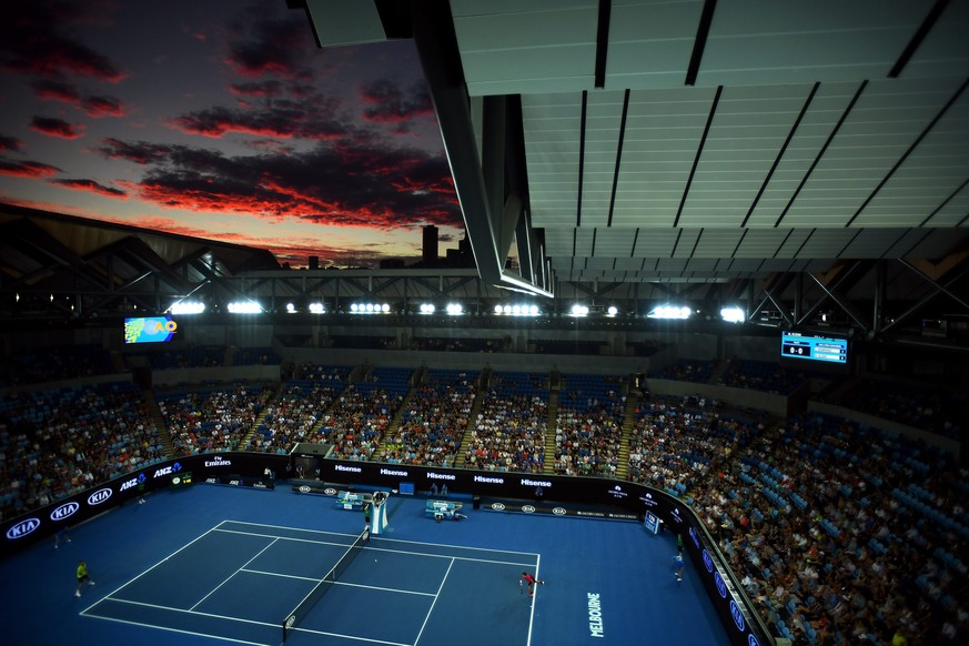 epa05721250 General view of a sunset over Margaret Court Arena during play between Stan Wawrinka of Switzerland and Martin Klizan of Slovakia during ther Men&#039;s Singles first round at the Australi ...
