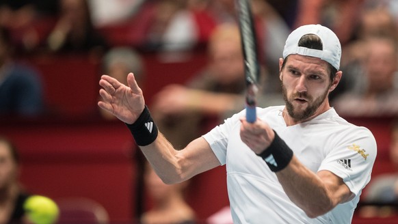 epa05602688 Juergen Melzer of Austria returns a shot against Roberto Bautista Agut of Spain during their first round match of the Erste Bank Open ATP tennis tournament in Vienna, Austria, 25 October 2 ...