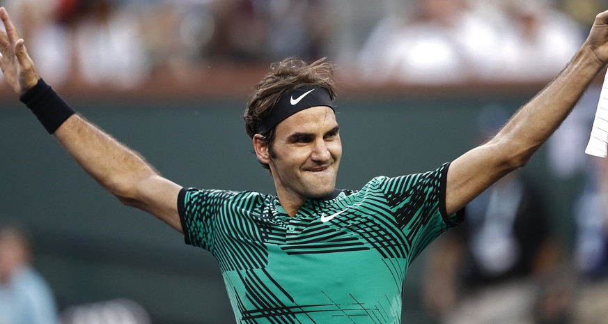 epa05851106 Roger Federer of Switzerland celabrates his win against Rafael Nadal of Spain after their match at the 2017 BNP Paribas Open tennis tournament at the Indian Wells Tennis Garden in Indian W ...