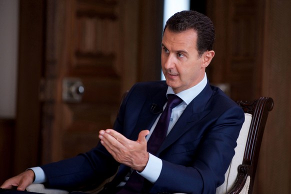 In this photo released on July 1, 2016, by the Syrian official news agency SANA, Syrian President Bashar Assad speaks during an interview with Australia&#039;s SBS news channel, in Damascus, Syria. We ...