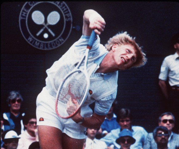 FILE - Then 17-year-old West German Boris Becker made tennis history to become the first unseeded Wimbledon tennis champion and the youngest ever winner. He beat Kevin Curren, South African-born but p ...