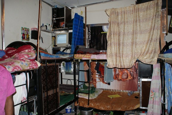 epa03955188 An Amnesty International handout photo dated October 2012 shows a bedroom in PCSI Specialties Qatar (PCSI) construction company workers&#039; accommodation in the Industrial Area of Doha,  ...