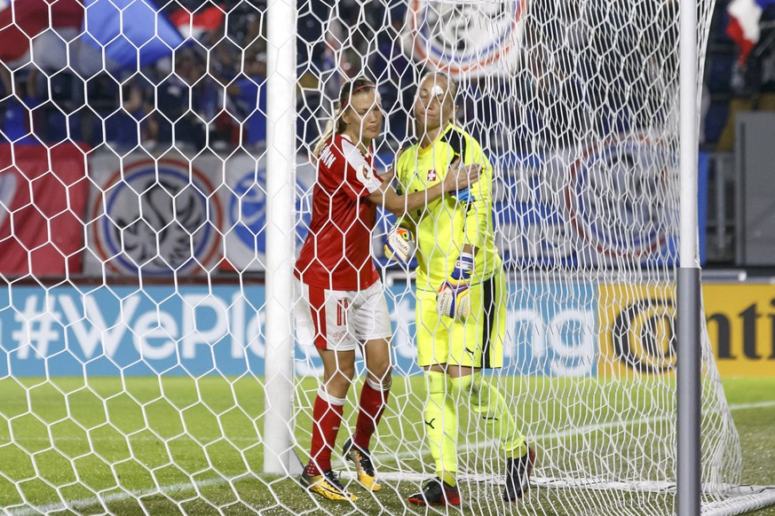 Switzerland&#039;s midfielder Lara Dickenmann, left, comforts her teammate goalkeeper Gaelle Thalmann after taking a goal, right, during the UEFA Women&#039;s Euro 2017 group C preliminary round match ...