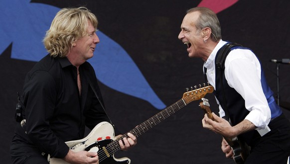 epa05687366 (FILE) A file picture dated 28 June 2009 shows guitarists and singers Rick Parfitt (L) and Francis Rossi (R) of Status Quo perform at the Glastonbury Festival of Contemporary Performing Ar ...