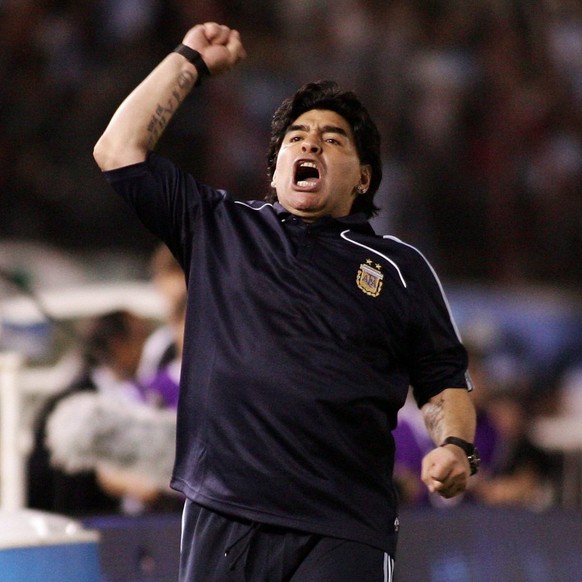 epa01893916 Argentinean head coach Diego Maradona celebrates the first goal of his team against Peru during their South Africa 2010 World Championship qualifying soccer at Monumental Stadium in Buenos ...