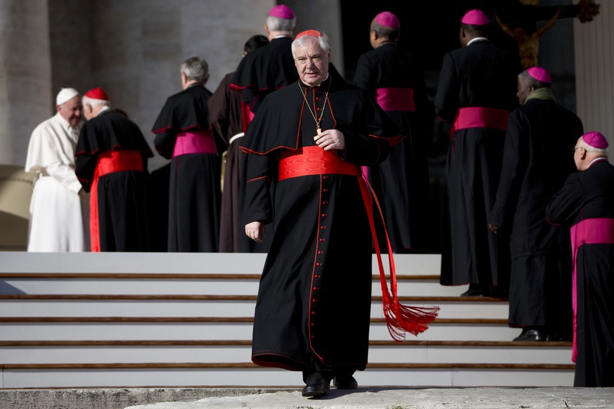 FILE - In this Dec. 2, 2015 file photo, German Cardinal Gerhard Ludwig Mueller leaves after greeting Pope Francis at the end of his general audience in St. Peter&#039;s Square at the Vatican. A second ...