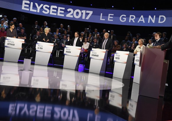 epa05888645 French presidential election candidates (L-R), far-left Lutte Ouvriere (LO) party Nathalie Arthaud; far-right National Front (FN) party Marine Le Pen; left-wing French Socialist (PS) party ...