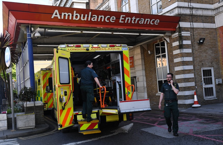 epa05959944 Ambulances stand outside an NHS hospital in London, Britain, 12 May 2017. According to a statement by Britain&#039;s National Health Service (NHS), several hospitals across England have be ...