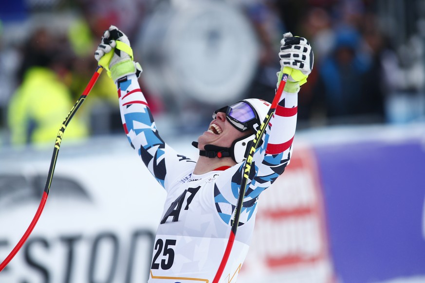 Austria&#039;s Christine Scheyer celebrates at the finish area during an alpine ski, women&#039;s World Cup downhill in Altenmarkt-Zauchensee, Austria, Sunday, Jan. 15, 2017. (AP Photo/Giovanni Aulett ...