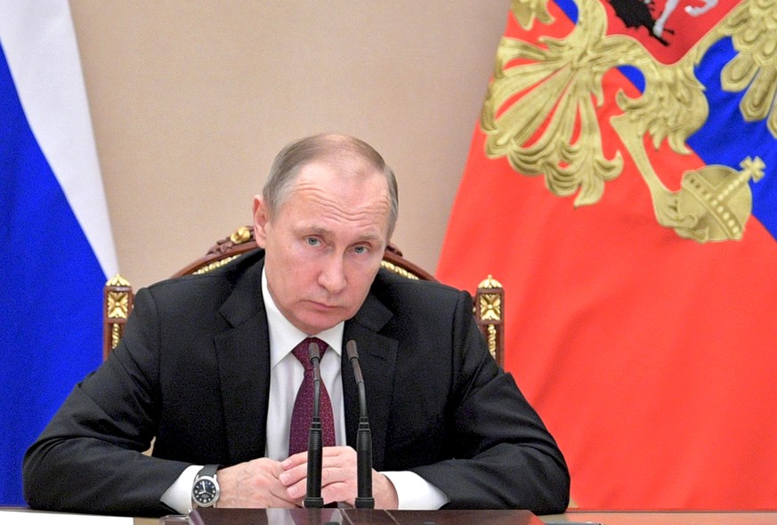 Russian President Vladimir Putin chairs a government meeting in the Kremlin in Moscow, Russia, Wednesday, Jan. 11, 2017. (Alexei Druzhinin/Sputnik, Kremlin Pool Photo via AP)