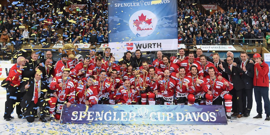 Players of Team Canada celebrater after winning the final game between Team Canada and Switzerlands HC Lugano at the 90th Spengler Cup ice hockey tournament in Davos, Switzerland, Saturday, December 3 ...