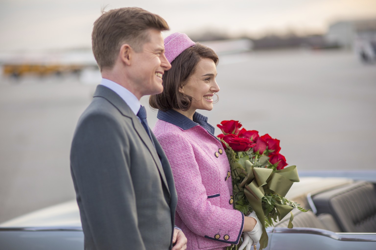 This image released by Fox Searchlight shows Caspar Phillipson as John F. Kennedy, left, and Natalie Portman as Jackie Kennedy in a scene from the film, &quot;Jackie.&quot; (William Gray/Fox Searchlig ...