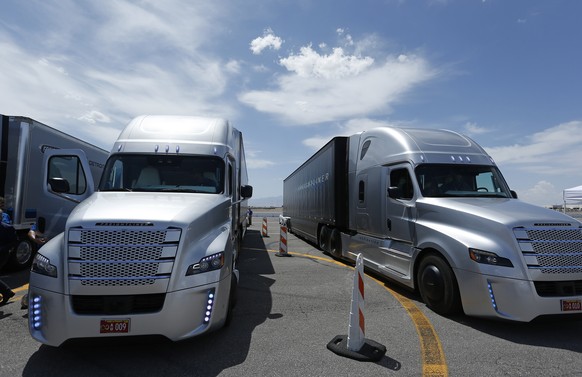 People load in to a Daimler Freightliner Inspiration self-driving truck for a demonstration Wednesday, May 6, 2015, in Las Vegas. Although much attention has been paid to autonomous vehicles being dev ...