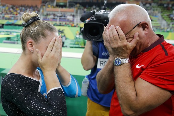 Switzerland&#039;s Giulia Steingruber, left, and her coach Zoltan Jordanov, right, react in the moment as she knows she won a medal, during the women’s Artistic Gymnastics Vault final in the Rio Olymp ...