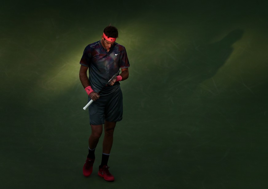 Juan Martin del Potro, of Argentina, pauses between serves from Dominic Thiem, of Austria, during the fourth round of the U.S. Open tennis tournament, Monday, Sept. 4, 2017, in New York. (AP Photo/And ...