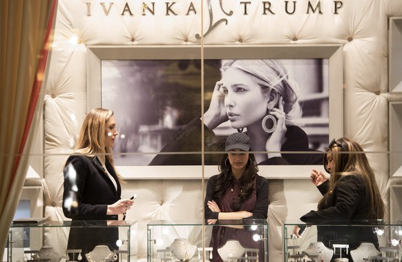epa05725061 Eric Trump&#039;s wife Lara Yunaska (L) stands in the Ivanka Trump boutique at Trump Tower in New York City, NY, USA, 17 January 2017. US President Elect Donald Trump is still holding meet ...