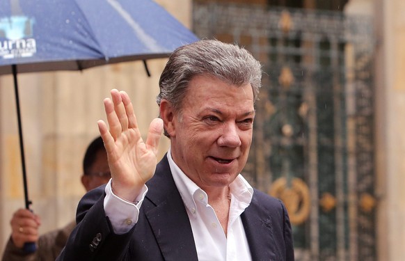 epa05574161 (FILE) A file picture dated 02 October 2016 shows Colombian President Juan Manuel Santos after voting for the referendum on the peace agreement between the government and the FARC guerrill ...