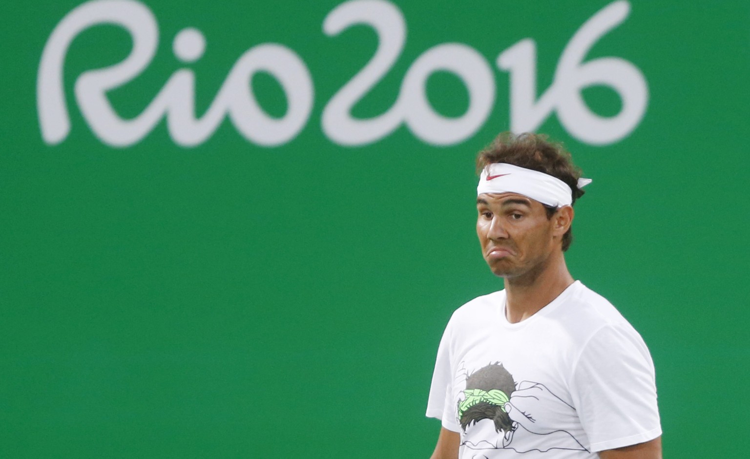 epa05455653 Rafael Nadal of Spain in action during doubles practice with his partner Marc Lopez (not pictured) of Spain at the Rio 2016 Olympic Games Tennis events at the Olympic Tennis Centre in the  ...