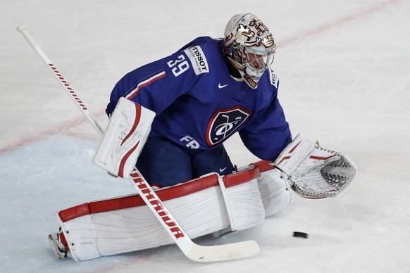 France&#039;s Cristobal Huet makes a save against a penalty shot during the Ice Hockey World Championships group B match between France and Slovenia in the AccorHotels Arena in Paris, France, Monday,  ...