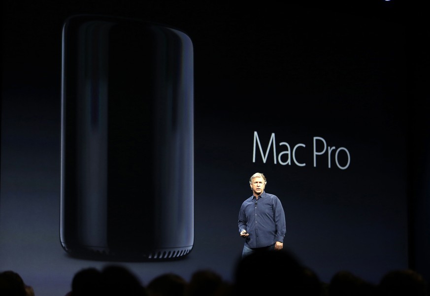FILE - In this Monday, June 10, 2013, file photo, Phil Schiller the senior vice president of worldwide marketing at Apple talks about the new Mac Pro during the keynote address of the Apple Worldwide  ...